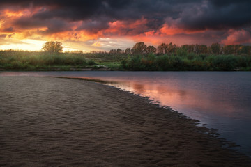 reflection of beautiful sunset in the riverside