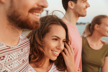 Loving couples outdoors on the beach.