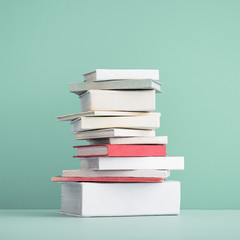 Stack of mini old books.	