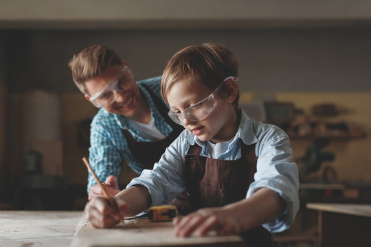 Father and son in the workshop