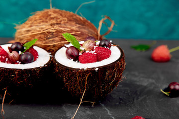 Fruit salad in coconut shell bowl