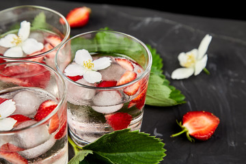 Strawberry detox water with jasmine flower.