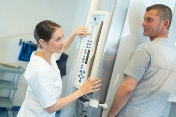 Radiologist setting up equipment for scan