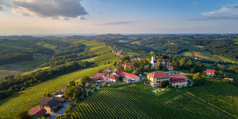 Kog panorama - village in the hills northeast of Ormož in northeastern Slovenia. The parish church...