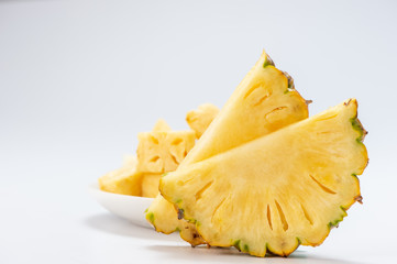 sliced pineapple isolated on white background