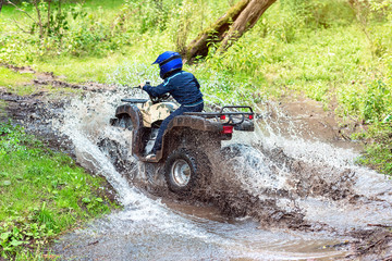 A trip on the ATV on the red road.