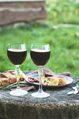 Red wine and light snacks, Grapes, wine, cheese, pie.