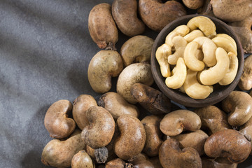 Cashew nuts on wooden background - Anacardium occidentale