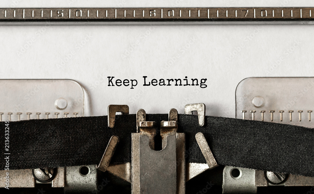 Poster text keep learning typed on retro typewriter