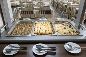 Buffet trays and white plates