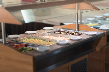 Buffet trays and white plates