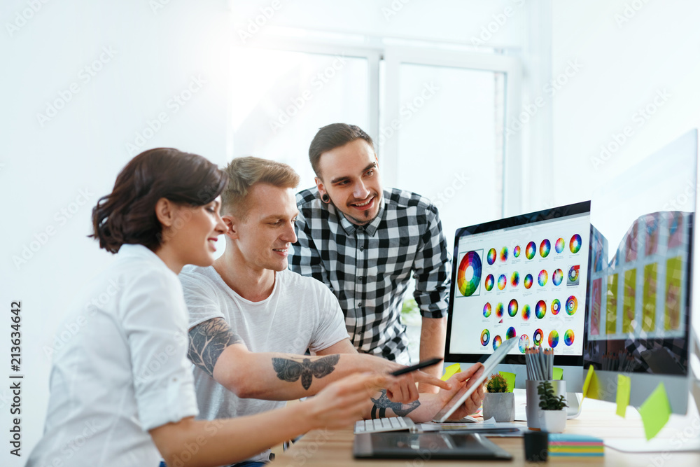 Aufkleber Web Design. Team Of Designers Working On Computer In Office