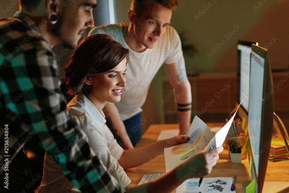 Poster Programmers Working On Software In Office