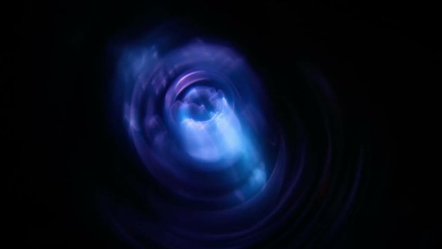 Plasma tunnel with blue and light blue flashes. Big electric shocks in an path. Blue lightning storm on a black background, electricity and power out of control. Energy, science and magic showed