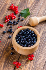 Currants and blueberries on the table. Summer berry.