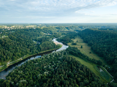 drone image. aerial view of forests and river Gauja in the middle in summer day. Latvia, Sigulda municipality © Martins Vanags