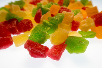 Fototapeta na wymiar colorful candied fruits on white background