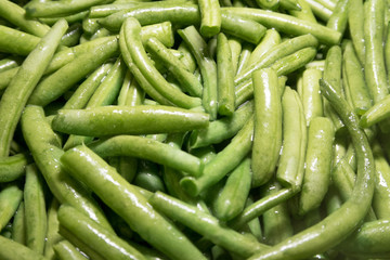 bright green asparagus on a frying pan