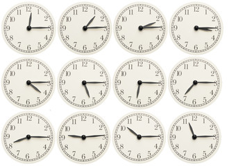 Set of office clocks showing various time isolated on white background