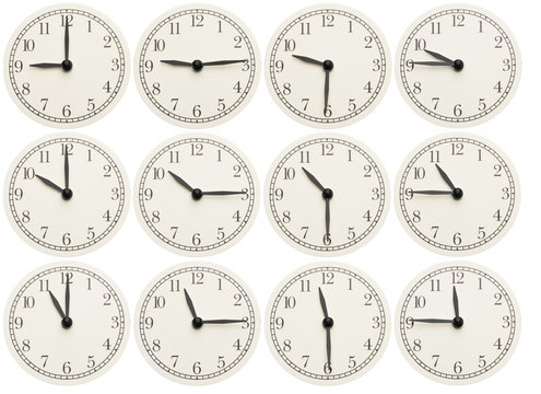 Set of office clocks showing various time isolated on white background