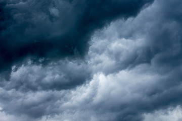 A sky with dark dramatic clouds during a storm or a storm_