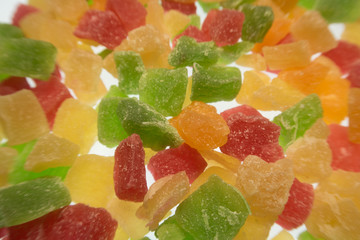 bright colorful candied fruits on a white background