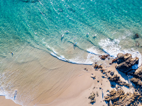 The Pass And Wategoes Beach At Byron Bay From An Aerial View With Blue Water