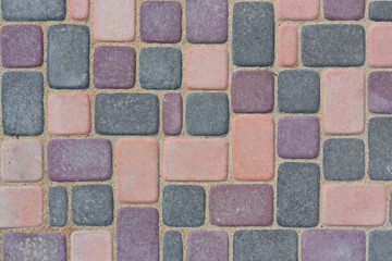 multi-colored tiles paving. top view.