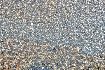 Multicolored natural stone texture, smooth granite surface, may be used as background 