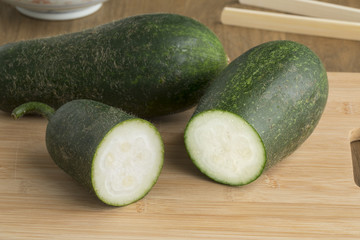  Fresh raw whole and half hairy cucumber