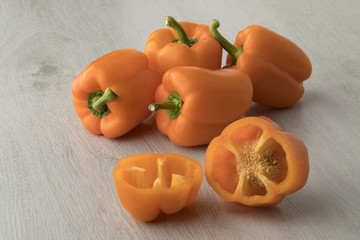 Fresh raw orange sweet bell peppers