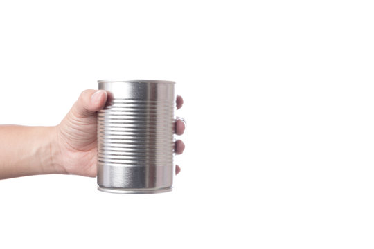 Hand holding tin or steel can made of aluminium for food