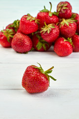 Ripe sweet strawberry on white background. Delicious summer berries. Nutrition of strawberry.