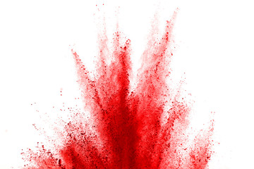 Abstract red powder explosion on white background. abstract red dust splatted on white background, Freeze motion of red powder exploding.