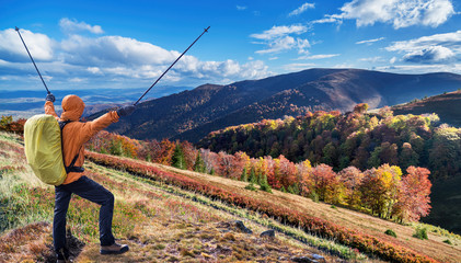 Obraz premium Hiker enjoying the trip in the top of mountain.