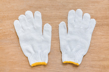 The white glove is placed on the desk. Of the industrialists.