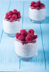 Chia pudding in glass with raspberry