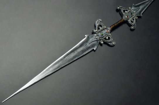 Metal sword on background ,close up