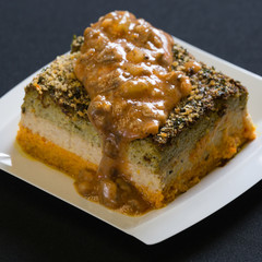 A slice of a coffee cake on a plate