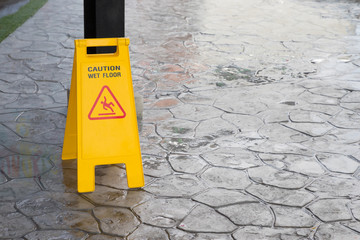 wet floor warning sign on floor