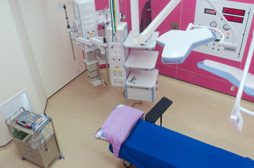 top view of interior view of operating room with modern surgical equipment at hospital, emergency case, surgery, medical technology, health care cancer and disease treatment concept