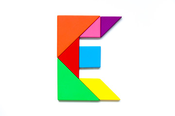 Color tangram puzzle in english alphabet e shape on white background