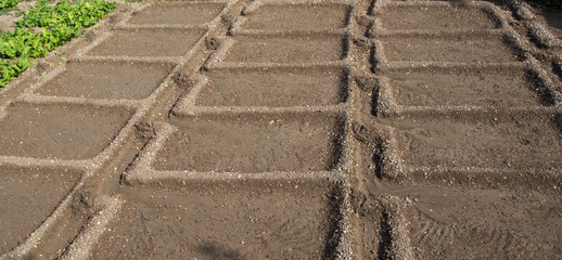 Plowed field with  traces in view