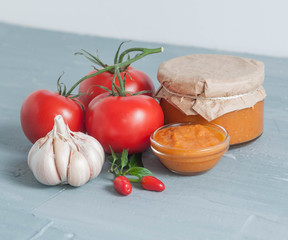 Hot chilli sauce and tomatoes