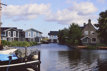 house, water, architecture, home, building, lake, sky, city, river, travel, blue, houses, landscape, sea, village, summer, town, construction, tree, tourism