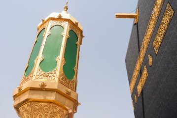 MECCA, SAUDI ARABIA - MAY 02 2018: The Holy Kaaba is the center of Islam inside Masjid Al Haram in Mecca. Covered with black silk cloth Kiswah with golden calligraphy in Arabic.