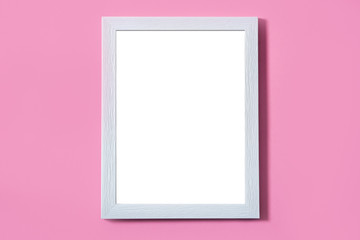 Blank white frame on pink background. Mock up with copy space.

