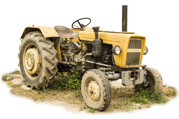 An old tractor produced in the 70s of the 20th century. Isolated photo of a general view of an agricultural machine. The equipment for a dairy farm.