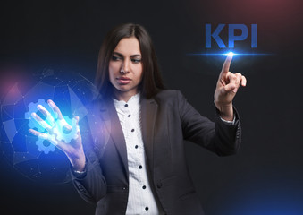 The concept of business, technology, the Internet and the network. A young entrepreneur working on a virtual screen of the future and sees the inscription: KPI