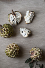 Sugar apples (Annona squamosa) on neutral background.